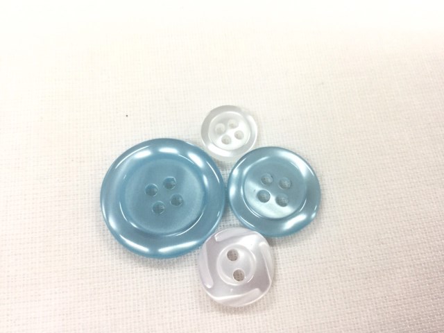 Plastic buttons