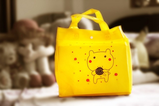Heat pressed non-woven bags