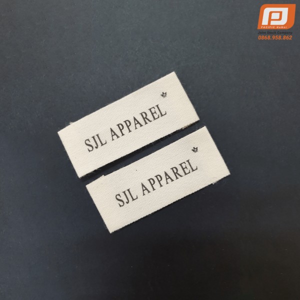 SJL APPAREL logo printed label