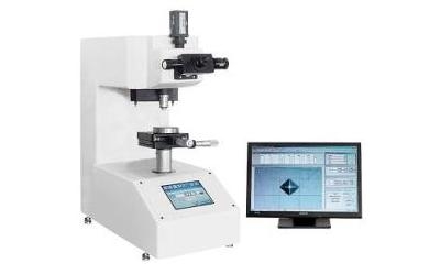 Vicker hardness measuring device
