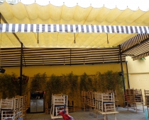 Pub retractable awnings