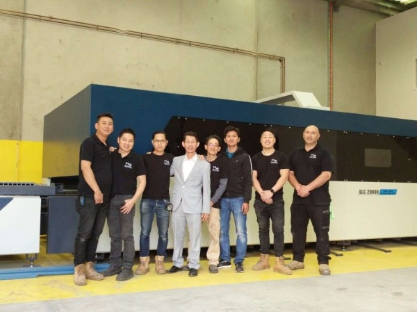 Handing the cutter to Australian customer
