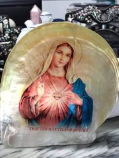 Blessed Mother image on seashell