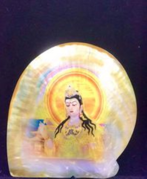 Buddha image on seashell