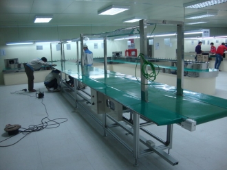 Assembly line conveyor