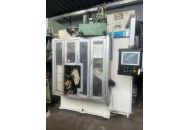 Spring making machine