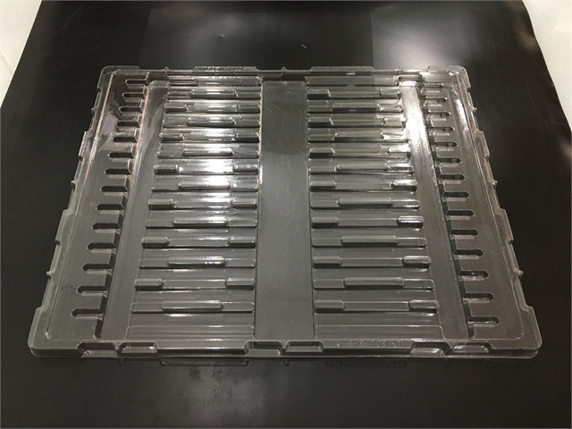 Vacuum formed plastic tray