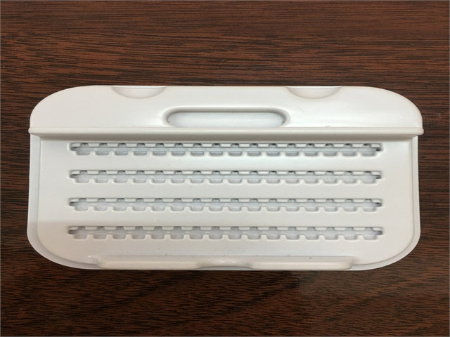Vacuum formed plastic tray