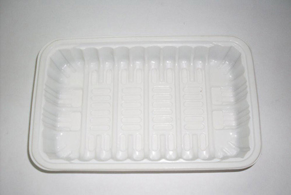 Plastic tray for frozen food industry