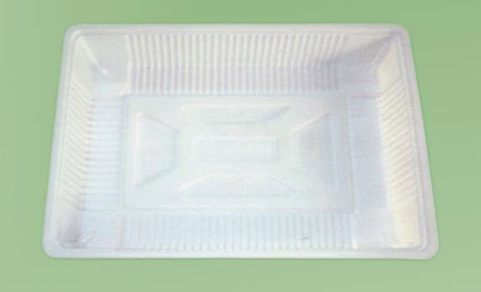 Plastic tray for frozen food industry
