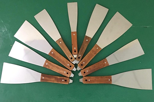 Stainless steel ink-retaining blade