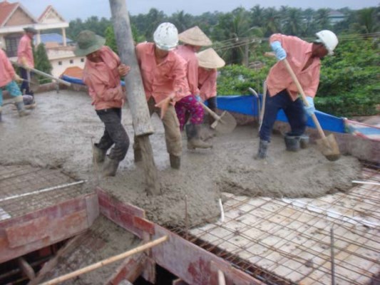 Raking concrete