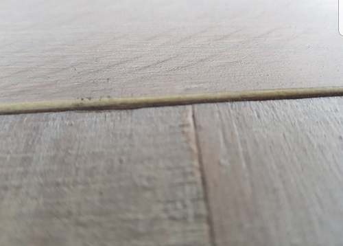 Scratching Veneer