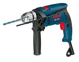 Hand-held wood drilling machine