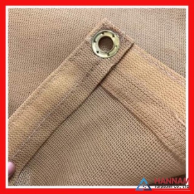 Sunshade net with eyelets
