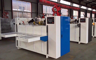 Semi-automatic carton stapling machine