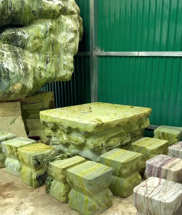 Monolithic stone table and chair set