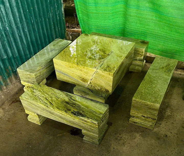 Monolithic stone table and chair set