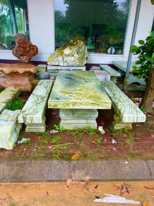 Monolithic stone table and chair set
