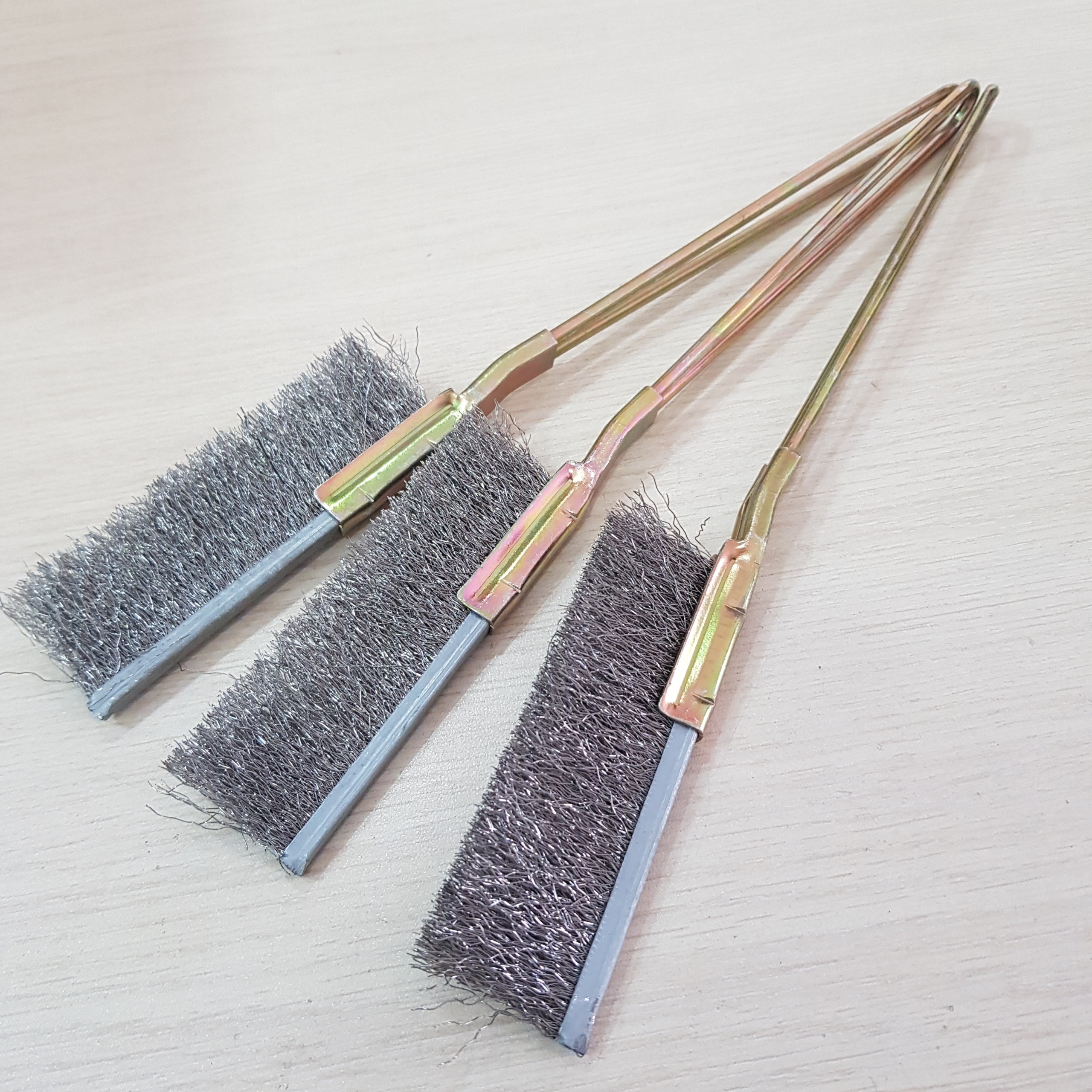 Steel wire brush with steel handle
