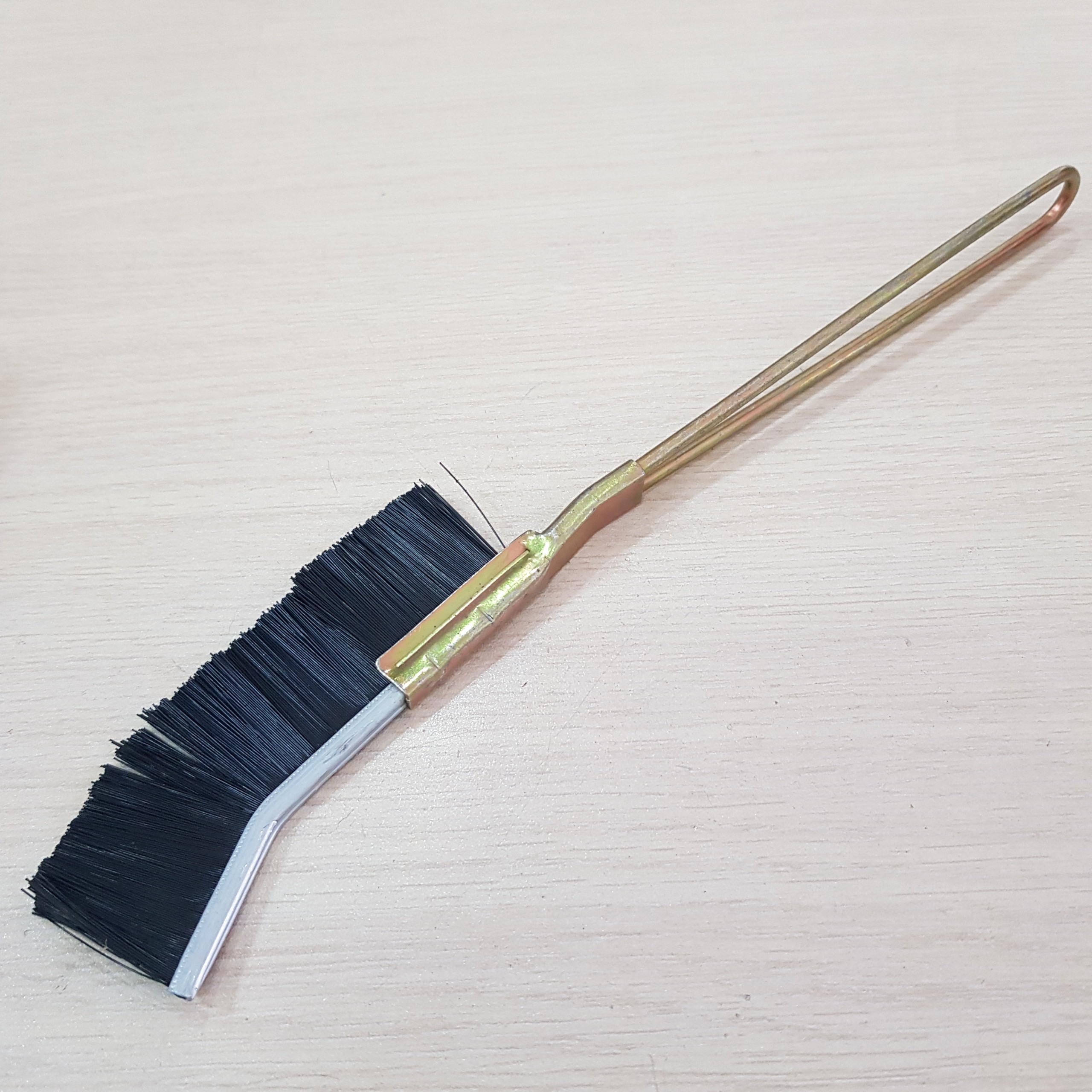 Nylon wire brush with steel handle