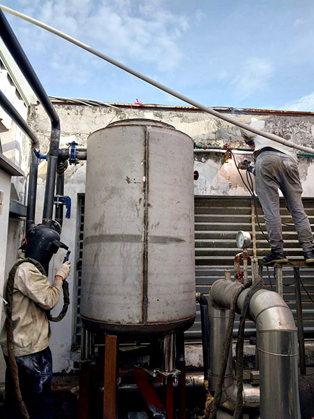 Industrial tank construction and installation