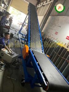 Inclined rubber conveyor