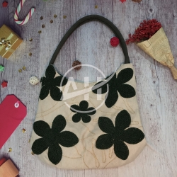 Hand embroidered handbag