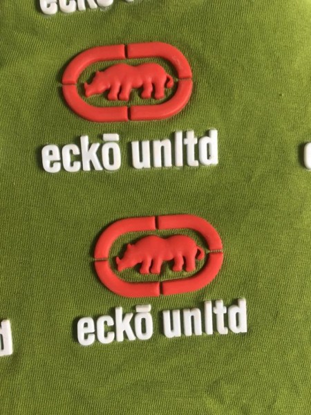 Embossed logo label