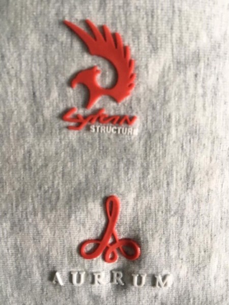 Embossed logo label