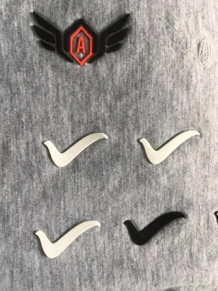 Embossed logo label