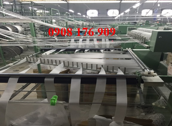 Knitting woven elastic
