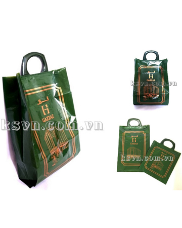 Rigid handle plastic bag
