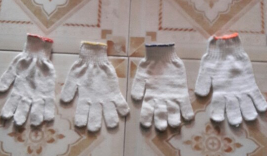 Cream-colored safety gloves