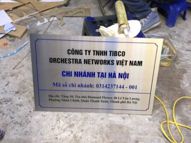 Brass and stainless steel signs