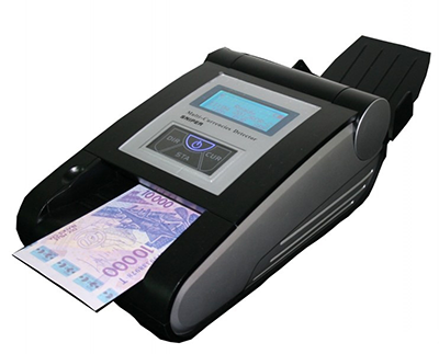 Counterfeit detector