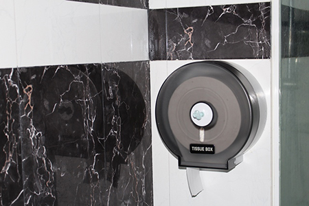 Jumbo roll toilet paper dispenser