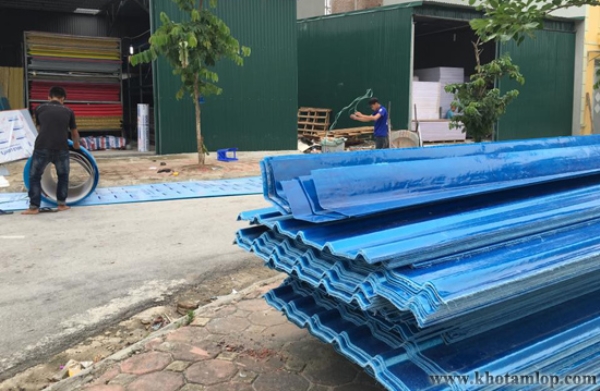 Composite plastic roofing sheet
