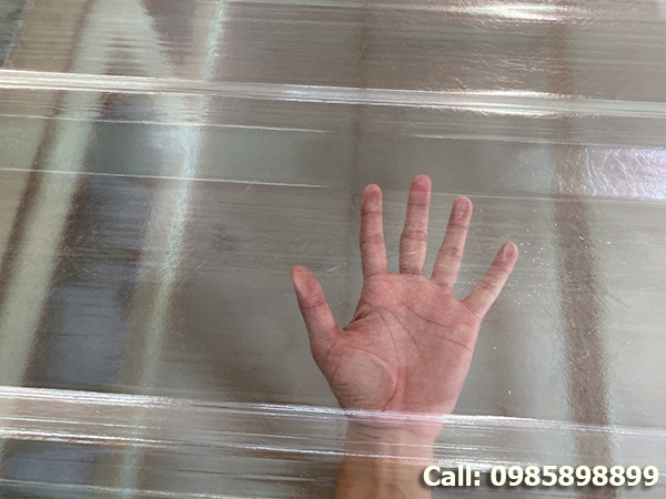 Composite plastic roofing sheet