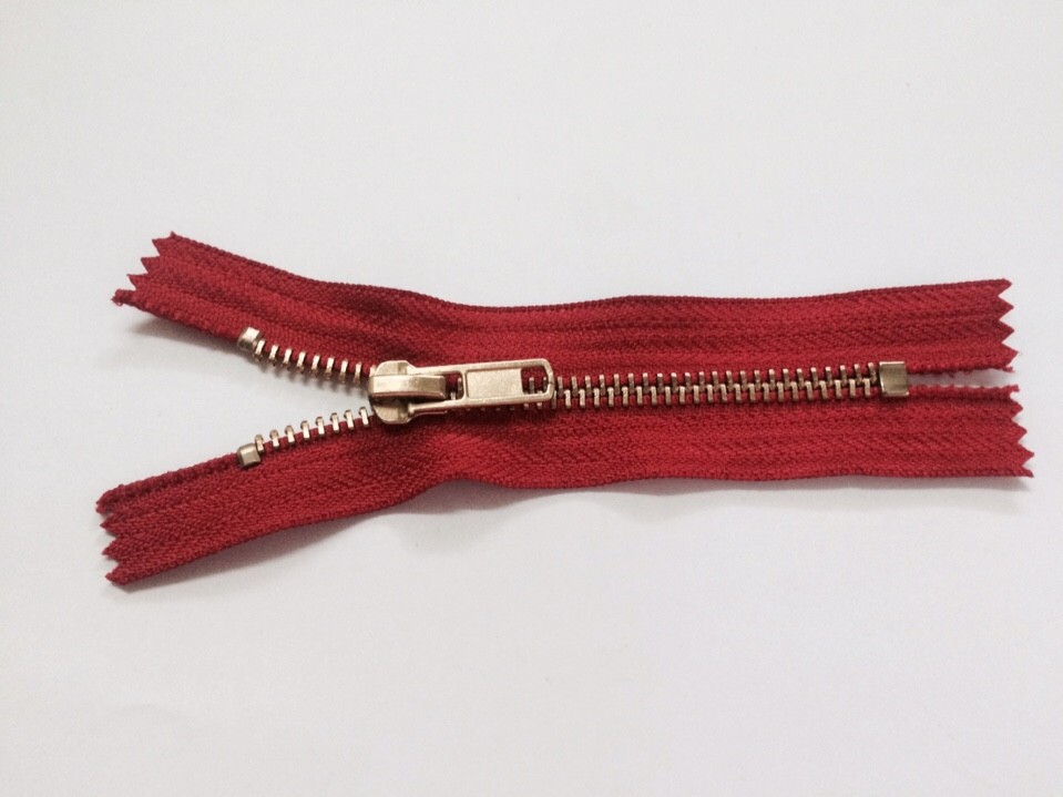 Shiny gold zippers