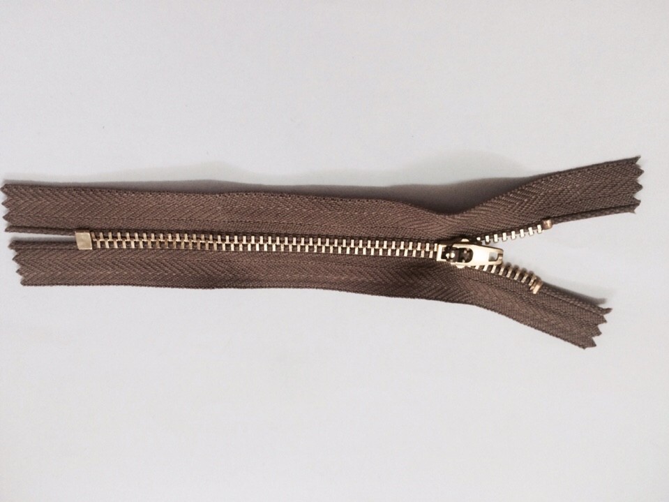 Shiny gold zippers