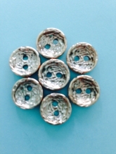 Plastic buttons