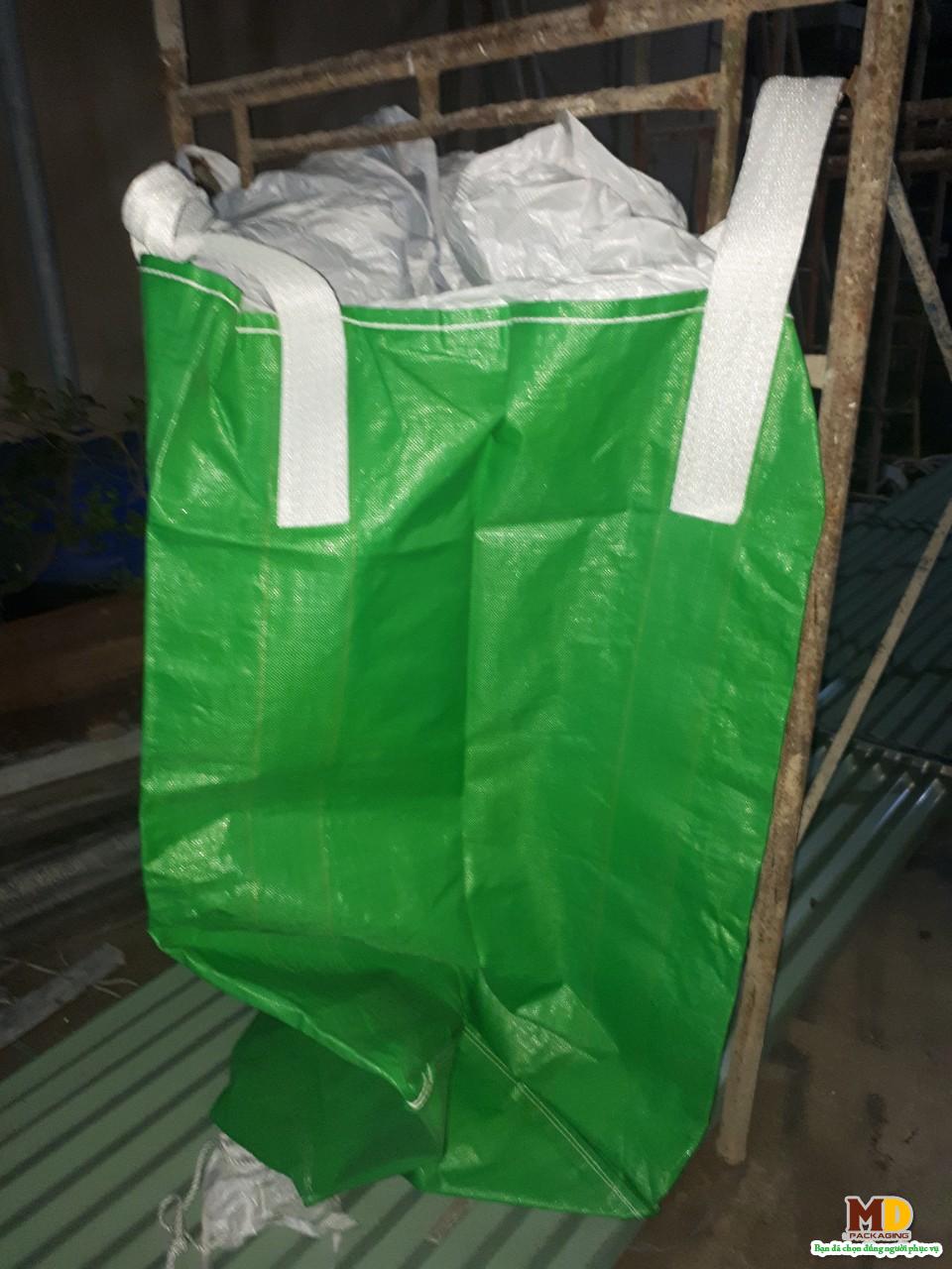 Duffle top discharge bottom jumbo bag