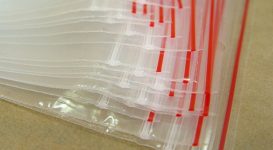Red border zipper bags