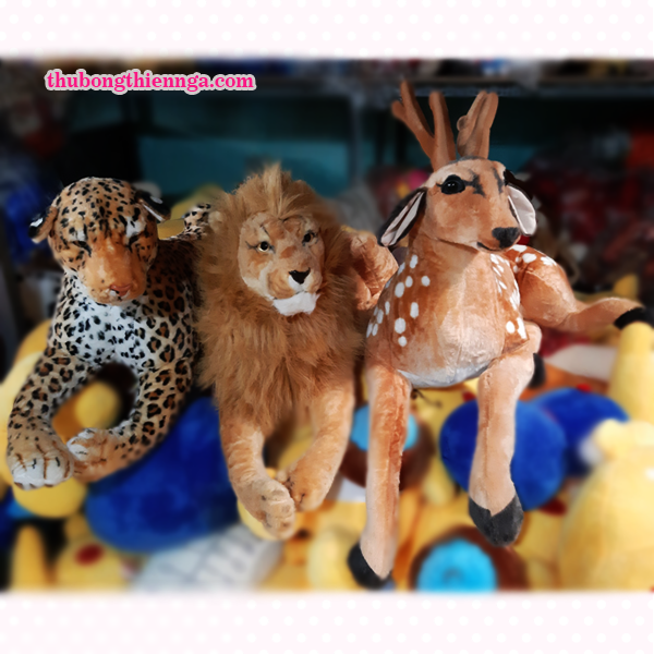 Stuffed tiger, cheetah, lion