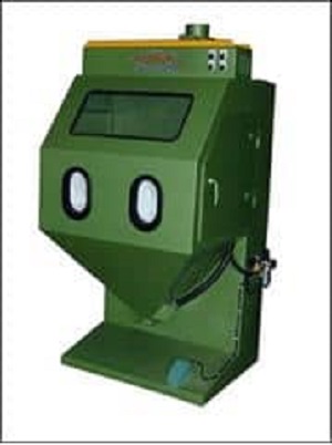 Hand held shot blasting machine