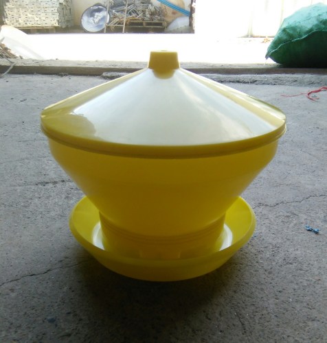 Rotary feeder with cover