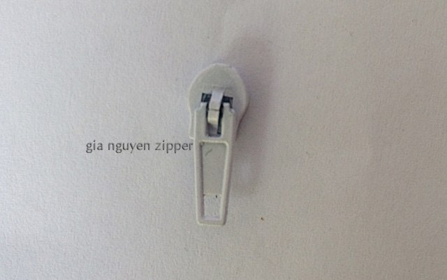 Zipper head