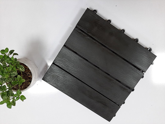 Wood plastic deck tiles