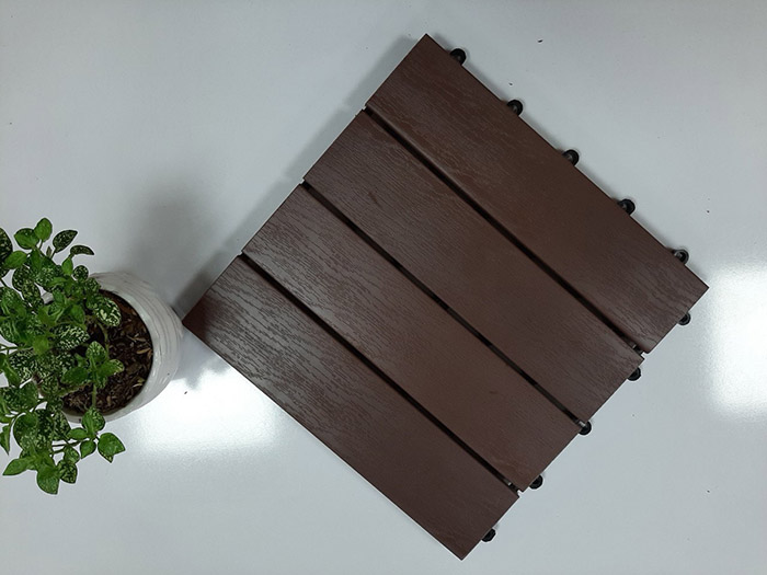 Wood plastic deck tiles